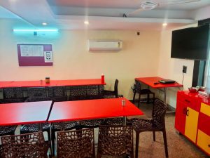 a picture of food court with dining table and chairs of UCH Girls PG
